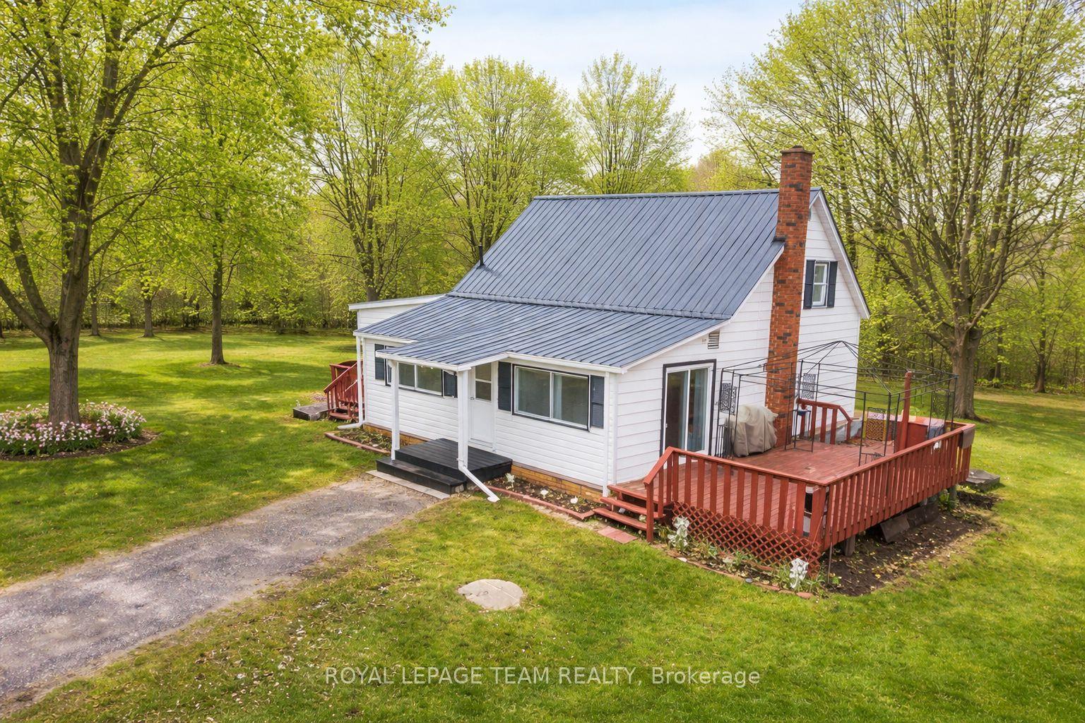 1448 PERRAULT Road — photo 1