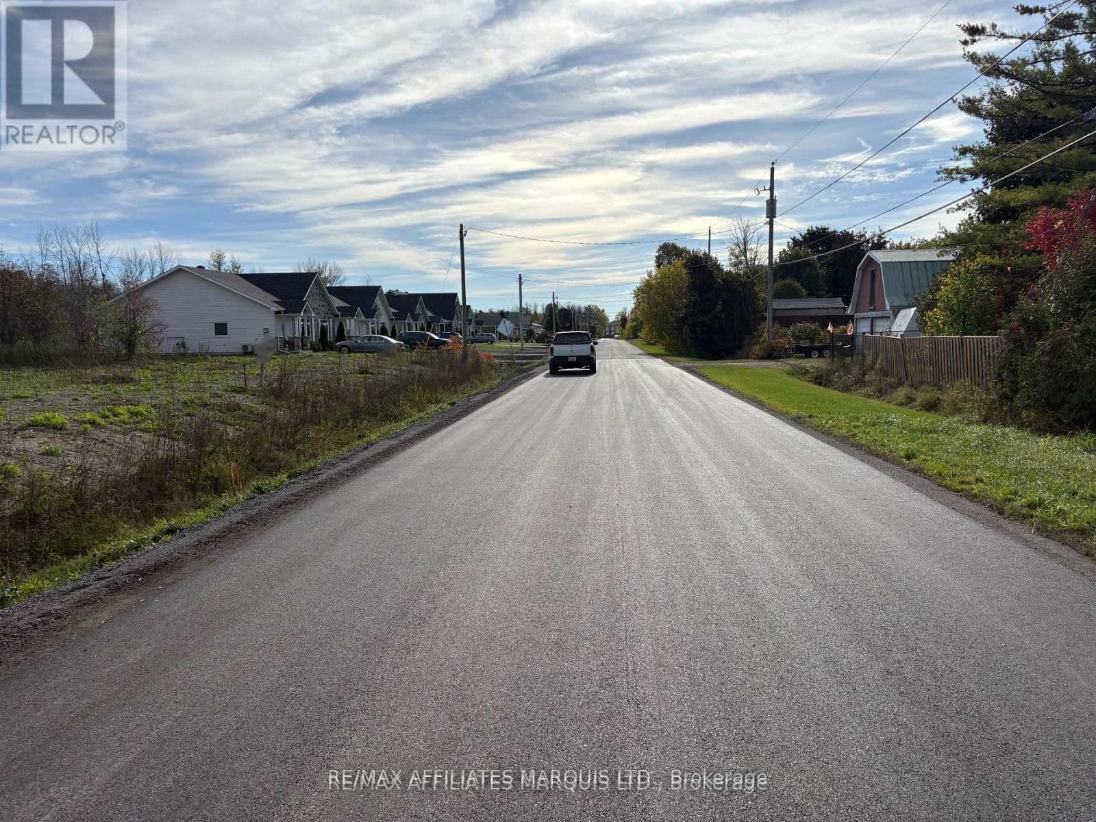 5361 Woodland Drive N — photo 1